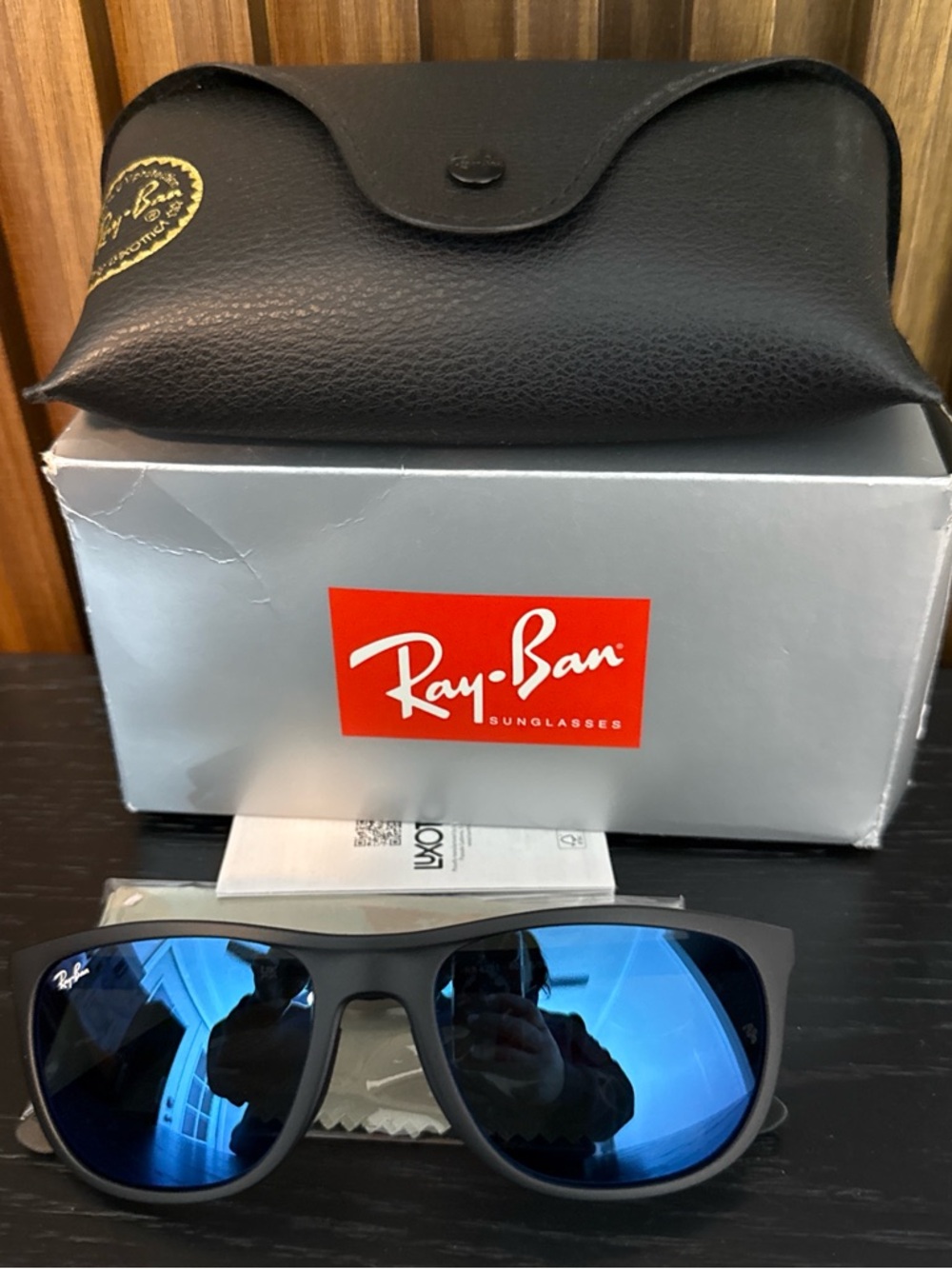Ray-Ban Black Frame Sunglasses with Blue Mirrored Lenses
